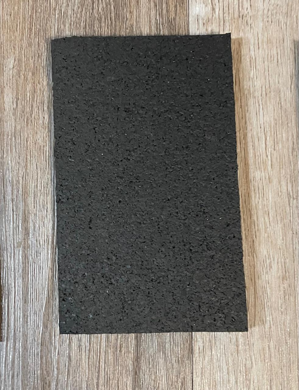 Solid black rubber flooring sample