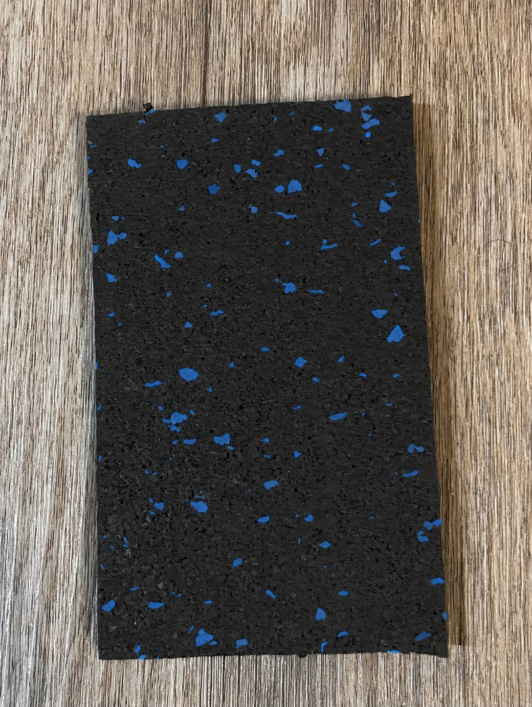 Black with blue fleck rubber flooring sample